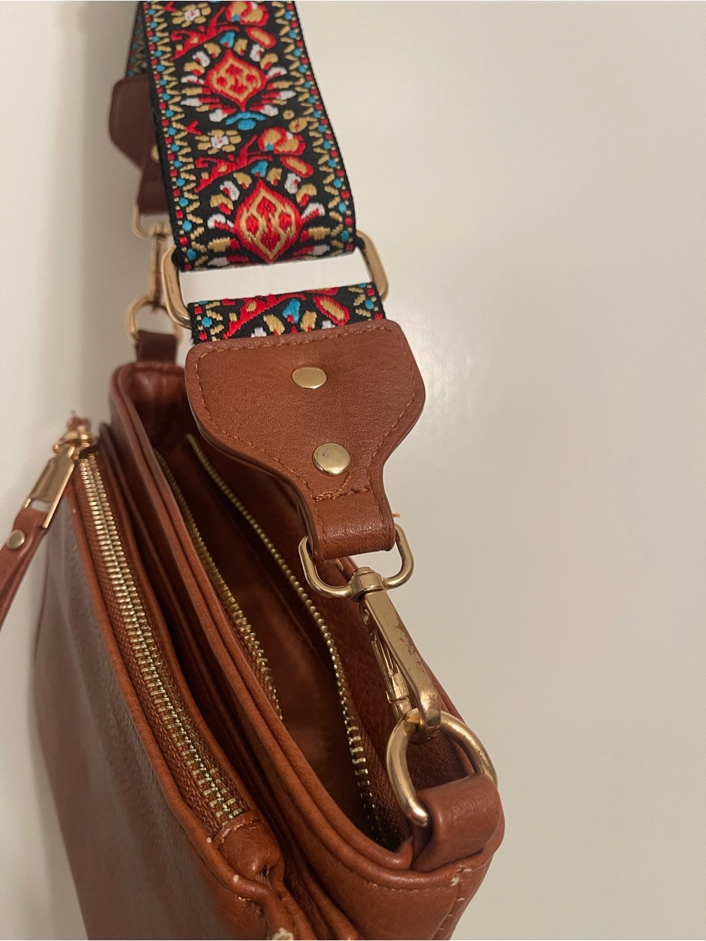 Myztique Multi pocketed Crossbody with Guitar Strap with magnetic closure